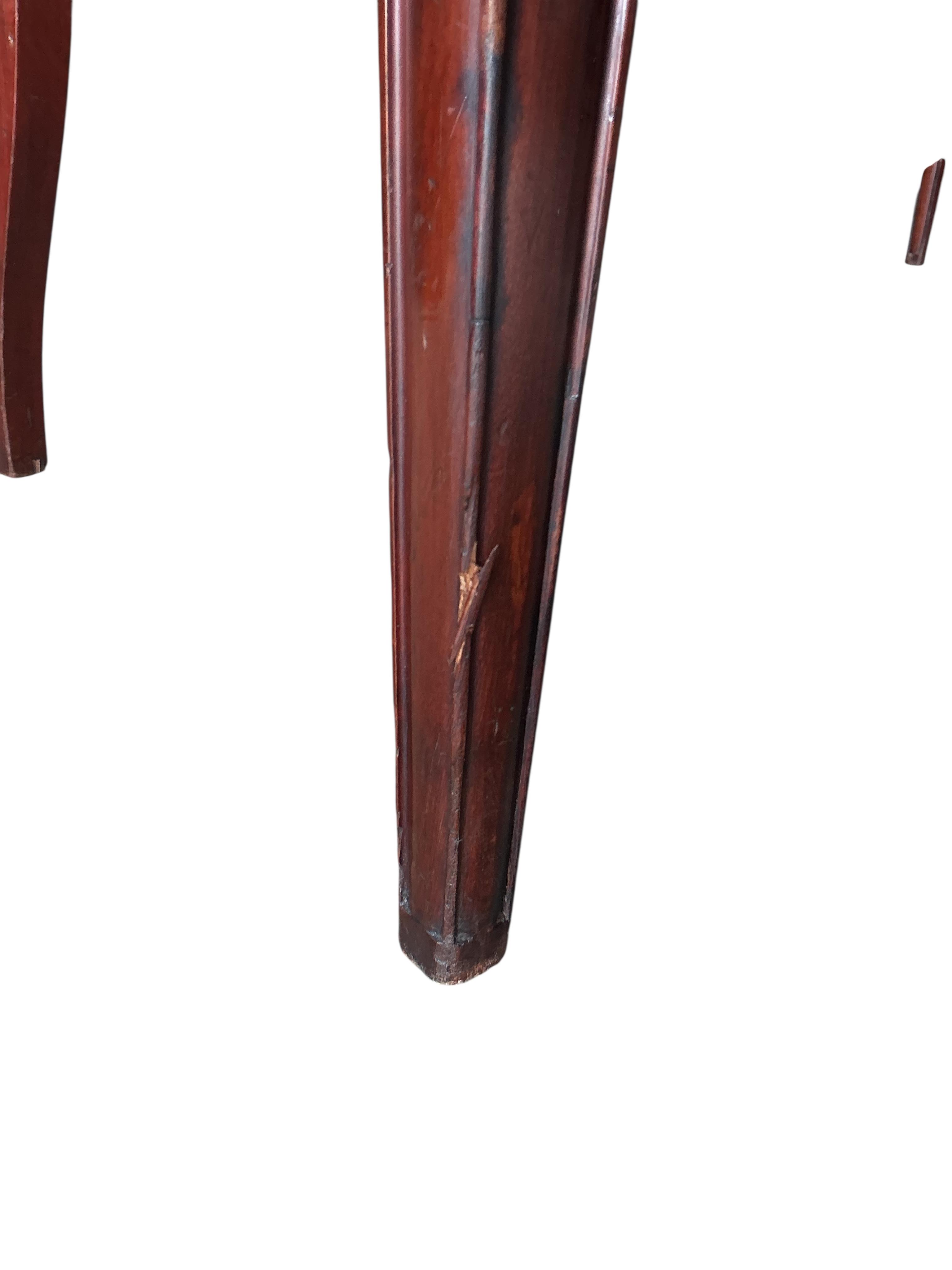 A pair of Victorian mahogany library chairs by Holland &Son, Mount Street, London, stamped J.Gould, width 67cm, depth 50cm, height 94cm
